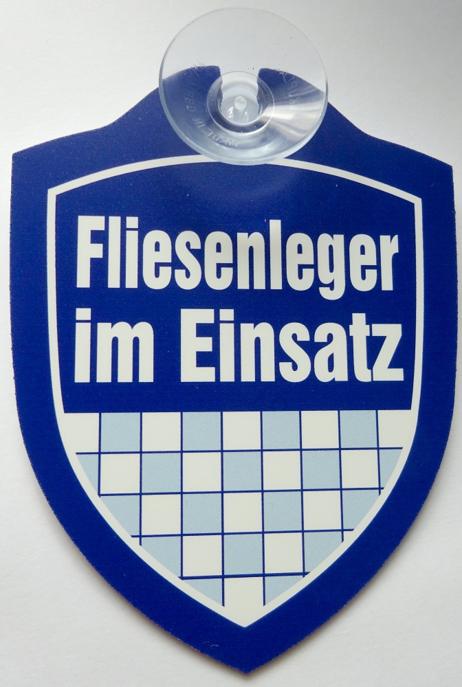 Schild mit Saugnapf - Fliesenleger im Einsatz